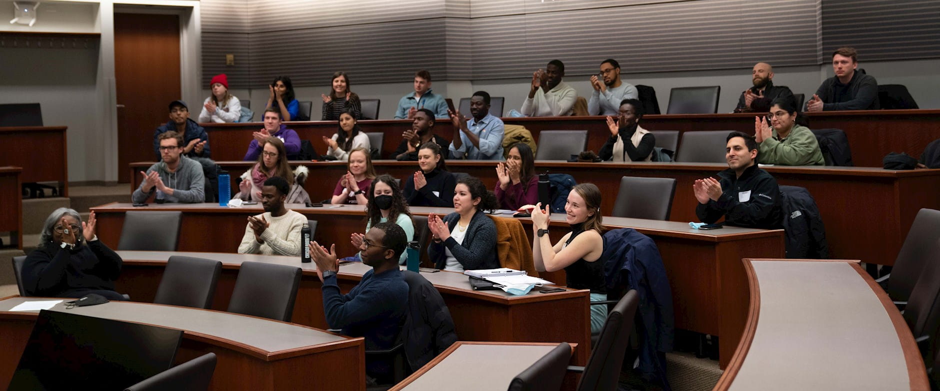 The audience applauds during Ghian Foreman's keynote - Chicago Booth Diversity Week, 2022